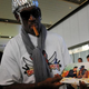 Dennis Rodman shows pictures of himself reportedly with North Korean leader Kim Jong Un to media as he arrives at Beijing International Airport on Sept. 7, 2013.
WANG ZHAO/AFP/Getty Images
